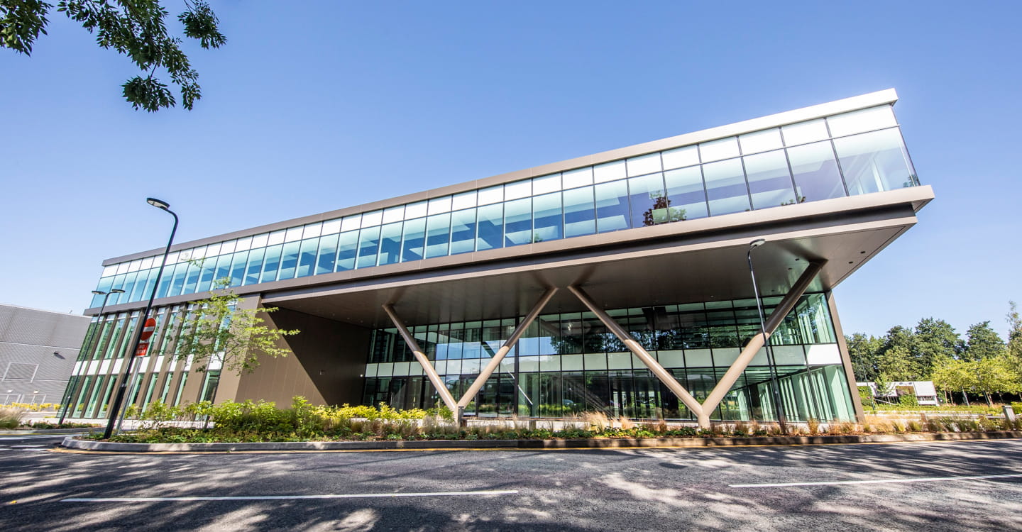 Glass modern building in Maidenhead with blue sky