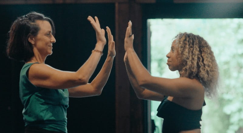 Ashley and Marjolaine dancing in a studio