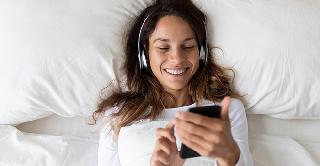 woman listening to a podcast