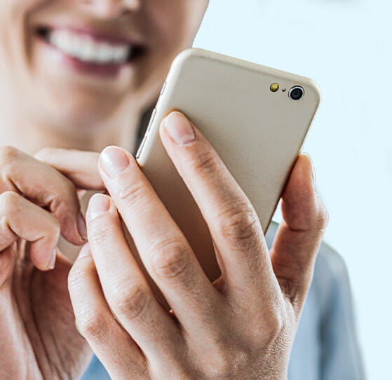 woman with phone in hand