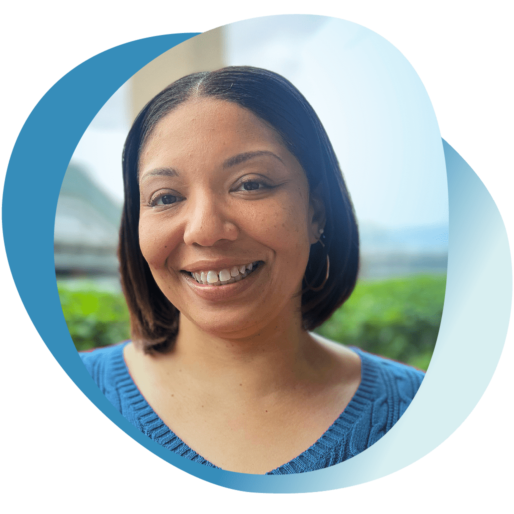 Toshia, a woman living with GPP, smiling and sharing her story of perseverance