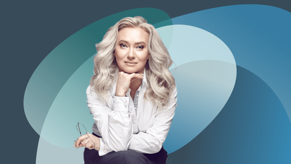 Confident woman with long blond hair in white shirt, holding glasses, with abstract blue background